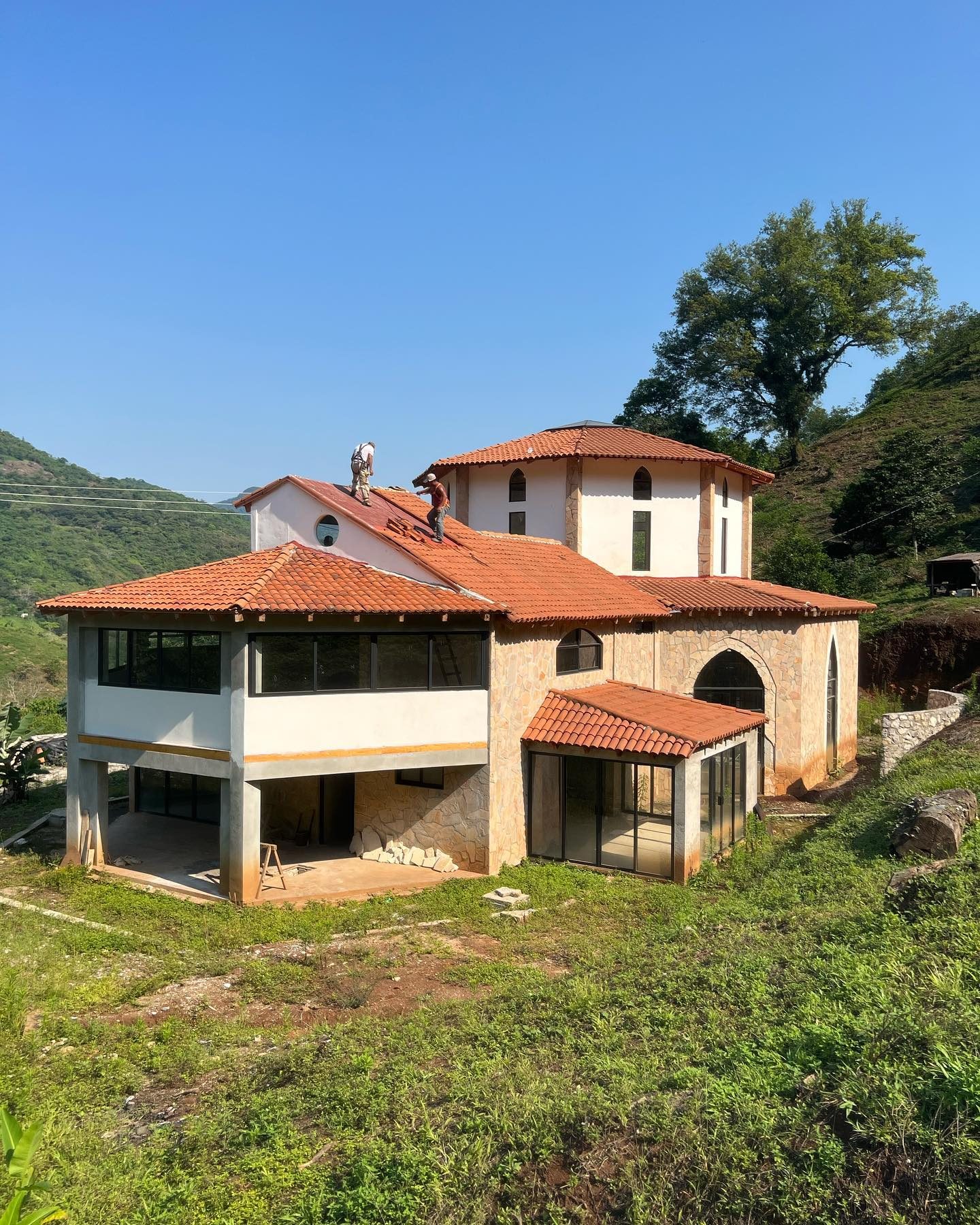 The finished centre with tiled roofs and glass doors